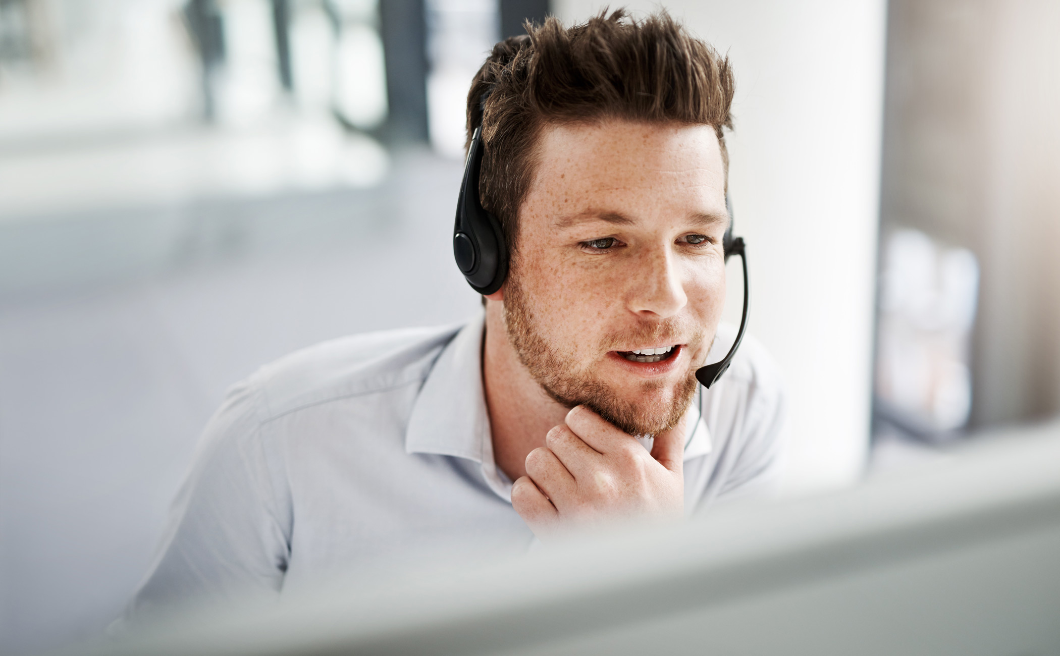 man on a call with headset